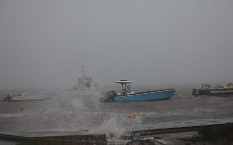 Boats remain anchored in a wharf as Hurricane Maria approaches in Guadeloupe island - Credit: Reuters