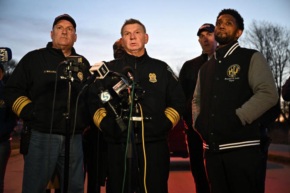 Baltimore Police Commissioner Richard Worley, with Mayor Brandon Scott (R) and Fire Department Chief James Wallace (L), at a press conference on the collapse of the Francis Scott Key Bridge (AFP via Getty Images)