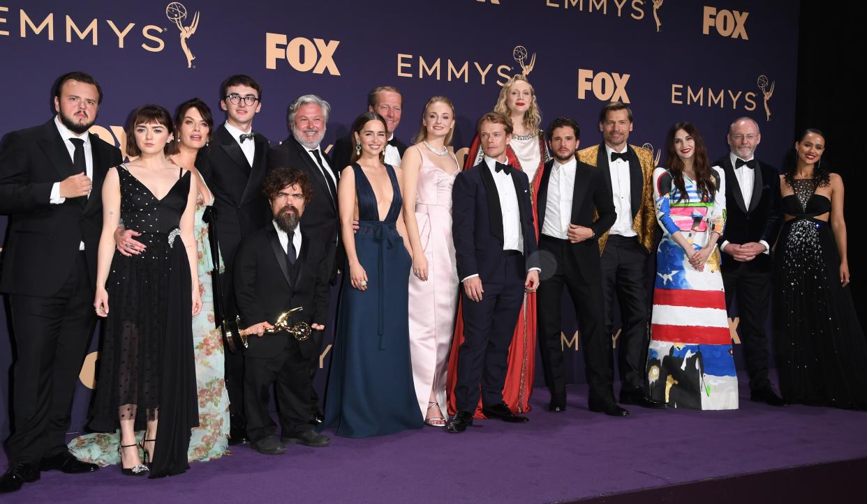 Maisie Williams, Isaac Hempstead Wright, Emilia Clarke, Peter Dinklage, Sophie Turner, Gwendoline Christie and cast pose with the Emmy for Outstanding Drama Series "Game Of Thrones" during the 71st Emmy Awards at the Microsoft Theatre in Los Angeles on September 22, 2019. (Photo by Robyn Beck / AFP)        (Photo credit should read ROBYN BECK/AFP/Getty Images)