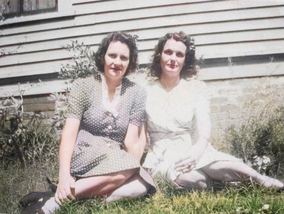 Annie D Seagraves, left, and her older sister, Agnes P.  Russell pose in this undated photo.