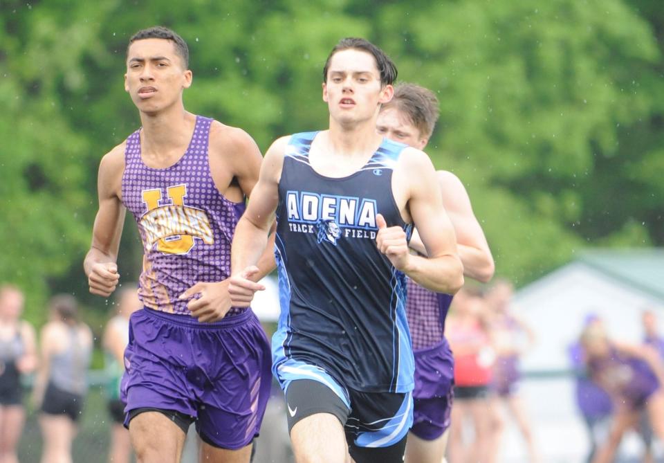Adena's Ryan Richendollar leads the pack during the boys 1600m run in the Scioto Valley Conference track and field championships at Huntington High School on May 12, 2023.