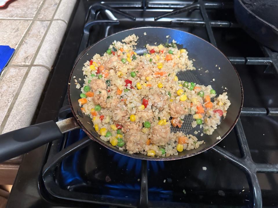 Trader Joe's chickenless riced cauliflower stir fry in a pan