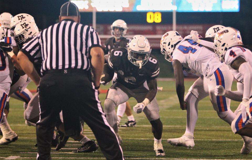 Darrion Dupree, a running back from Mount Carmel High School in Chicago, carries the ball during the team's season-opening win over East St. Louis at Hancock Stadium in Normal, Ill. on Saturday Aug. 26, 2023.