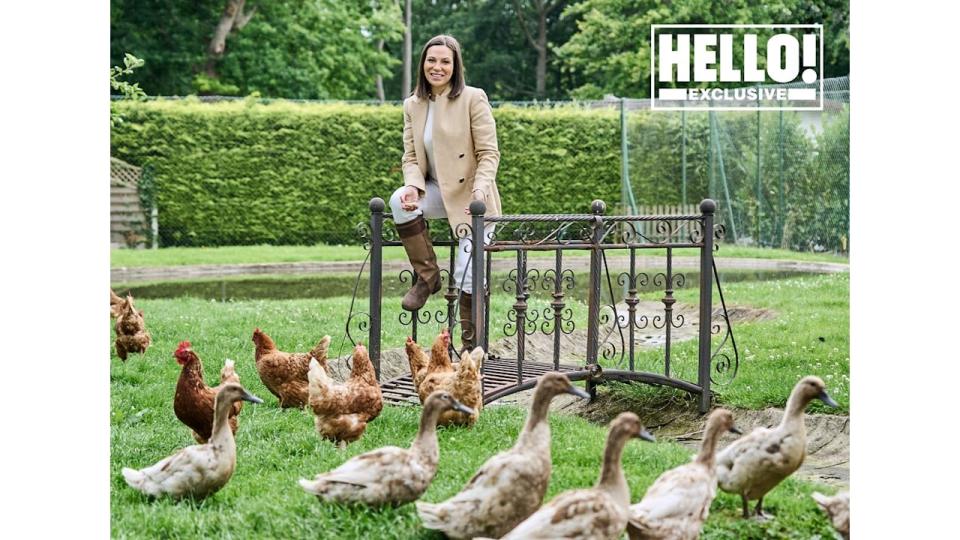 Lilia Mascolo posing with chickens and ducks at Surrey home Summerdown Manor