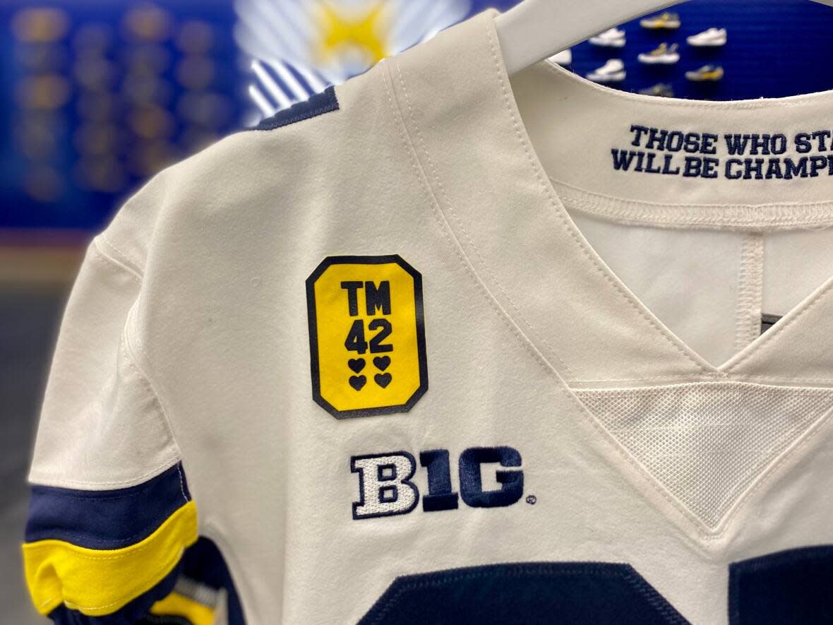 Michigan footballers will wear this logo at Saturday's Big Ten Championship, honouring the victims of a fatal school shooting that happened Monday. (Michigan Football/Twitter - image credit)