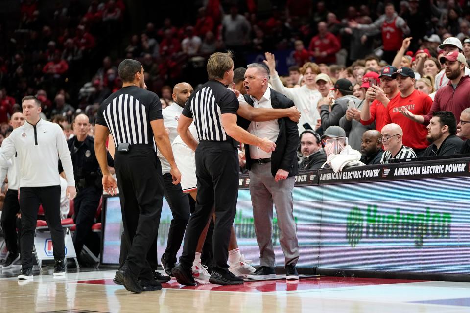 Feb 2, 2023; Columbus, OH, USA;  Ohio State Buckeyes head coach Chris Holtmann yells at the official John Higgins after being ejected from the game during the first half of the NCAA men’s basketball game against the Wisconsin Badgers at Value City Arena. Mandatory Credit: Adam Cairns-The Columbus Dispatch