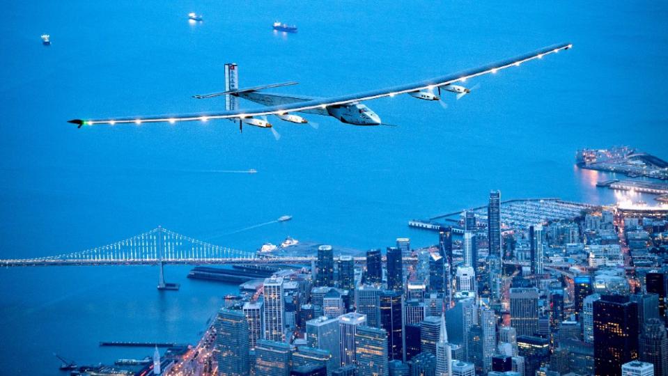 Solar Impuse 2 flying over New York on its global solar-powered flight. - Credit: Courtesy AP