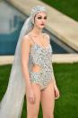 Forget wedding dresses! Chanel's take on bridal includes an embellished cut-out swimsuit complete with sequined veil and cap.