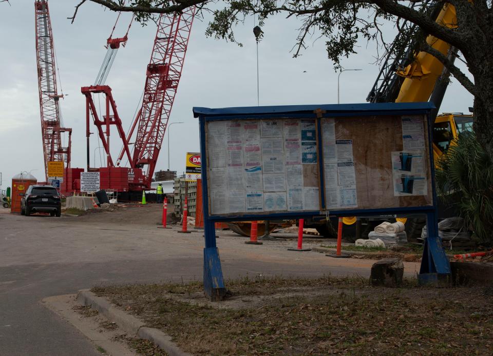 Skanska work crews and contractors continue to work Wednesday to complete the construction of the Pensacola Bay Bridge replacement.