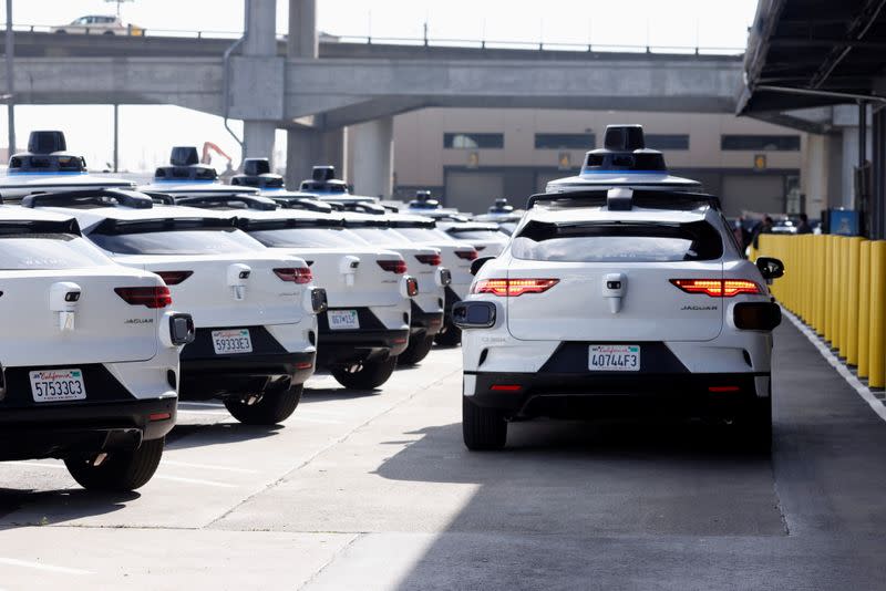 Jaguar I-Pace electric vehicles are tested at Waymo's operations center in San Francisco