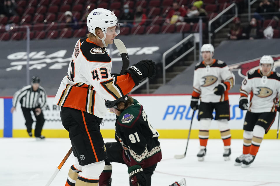 Anaheim Ducks center Danton Heinen (43) celebrates after scoring a goal against the Arizona Coyotes in the first period during an NHL hockey game, Tuesday, Jan. 26, 2021, in Glendale, Ariz. (AP Photo/Rick Scuteri)