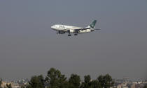 FILE PHOTO - A Pakistan International Airlines (PIA) passenger plane arrives at the Benazir International airport in Islamabad, Pakistan December 2, 2015. REUTERS/Faisal Mahmood/File Photo