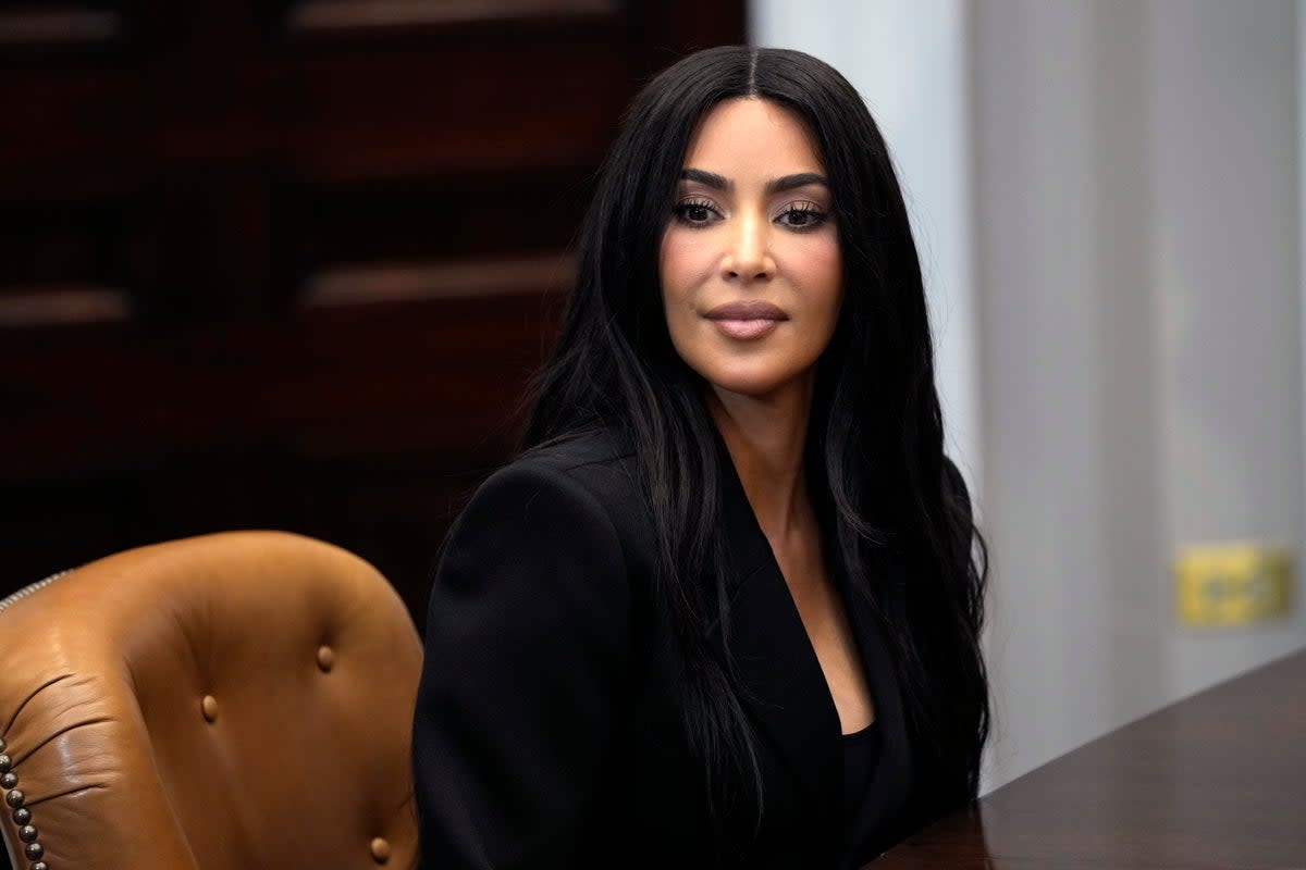 Kim Kardashian listens during a discussion in the Roosevelt Room of the White House in Washington, Thursday, April 25, 2024 (AP)