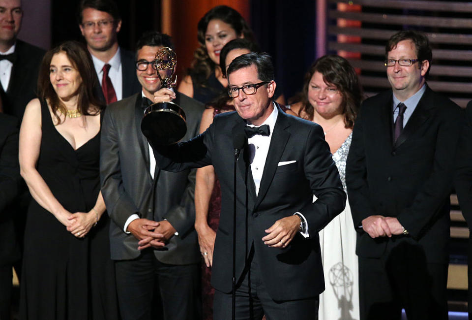 Stephen Colbert and his crew accepting an Emmy for "The Colbert Report"