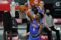 Oklahoma City Thunder guard Hamidou Diallo (6) dunks the ball during the fourth quarter of an NBA basketball game against the Los Angeles Clippers Sunday, Jan. 24, 2021, in Los Angeles. (AP Photo/Ashley Landis)