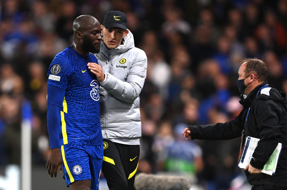 Chelsea's Romelu Lukaku is embraced by manager Thomas Tuchel upon being substituted.