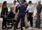 <p>President Donald Trump (C) and first lady Melania Trump (2ndR) are greeted by Texas Governor Greg Abbott (2ndL) prior to receiving a briefing on Tropical Storm Harvey relief efforts in Corpus Christi, Texas, Aug. 29, 2017. (Photo: Carlos Barria/Reuters) </p>