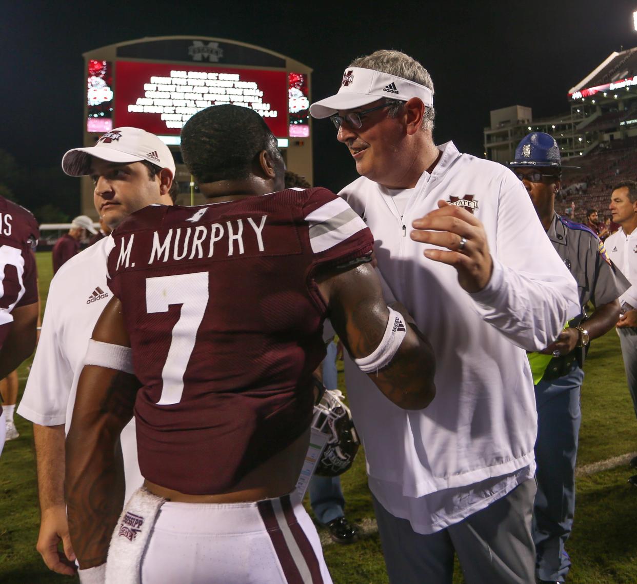 Mississippi State's Marcus Murphy (7) and Mississippi State head coach Joe Moorhead embrace following the win. Mississippi State played Stephen F. Austin in the 2018 football season opener at Davis-Wade Stadium in Starkville on September 1, 2018. Photo by Keith Warren/Mandatory Credit