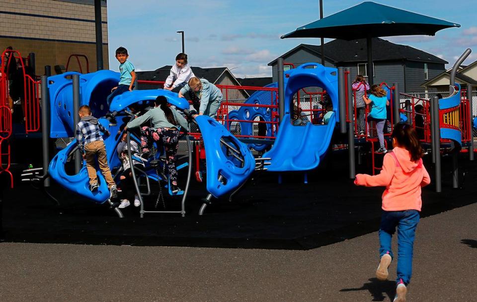 Students flock to the playground at Three Rivers Elementary in Pasco, which has been ranked in the top 10 inclusive school playgrounds in the United States.