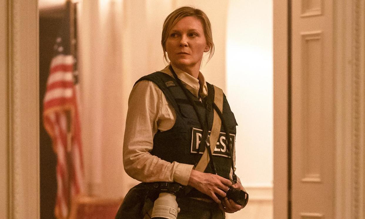 <span>Kirsten Dunst in Civil War, posters for which have been created using AI.</span><span>Photograph: Murray Close/AP</span>