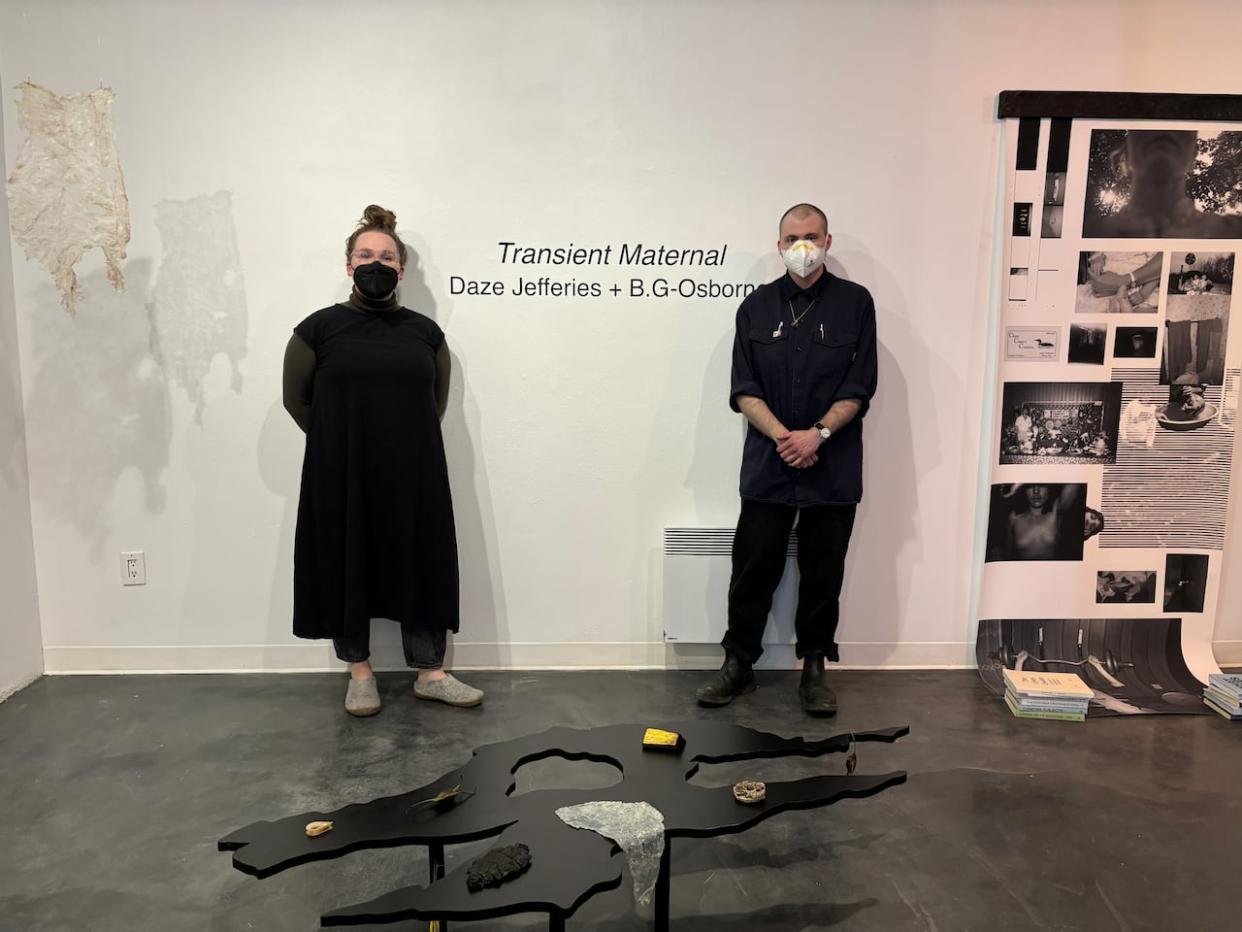 Daze Jefferies, left, and B.G. Osborne have a new collaborative exhibit at Eastern Edge gallery, built largely around grief and mother figures. (Sarah Blackmore/CBC - image credit)