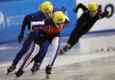 Russia's Semion Elistratov (184) leads skaters during a men's 1500 metres heat at the World Short Track Speed Skating Championships 2010 at Winter Sport hall in Sofia, March 19, 2010. REUTERS/Oleg Popov