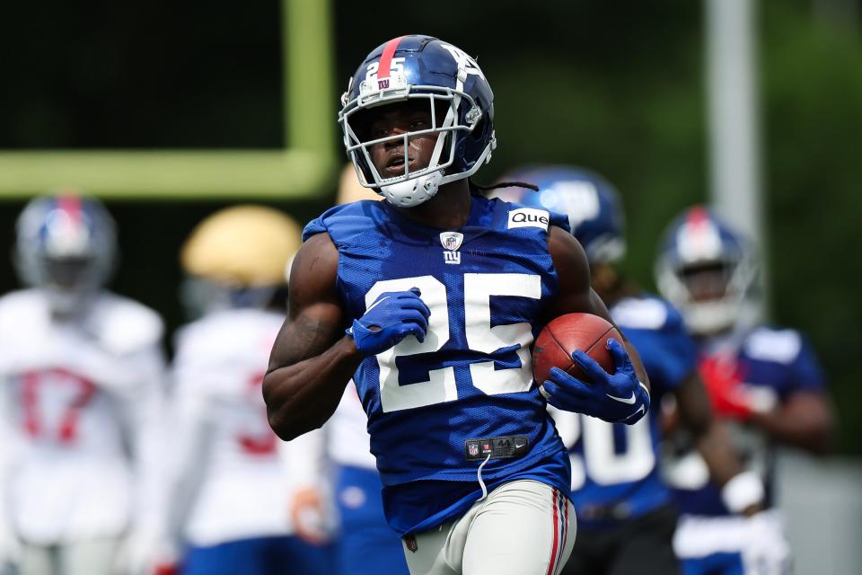 EAST RUTHERFORD, NEW JERSEY - JUNE 06: Dante Miller #25 of the New York Giants participates in drills during New York Giants OTA Offseason Workouts at NY Giants Quest Diagnostics Training Center on June 06, 2024 in East Rutherford, New Jersey. (Photo by Luke Hales/Getty Images)