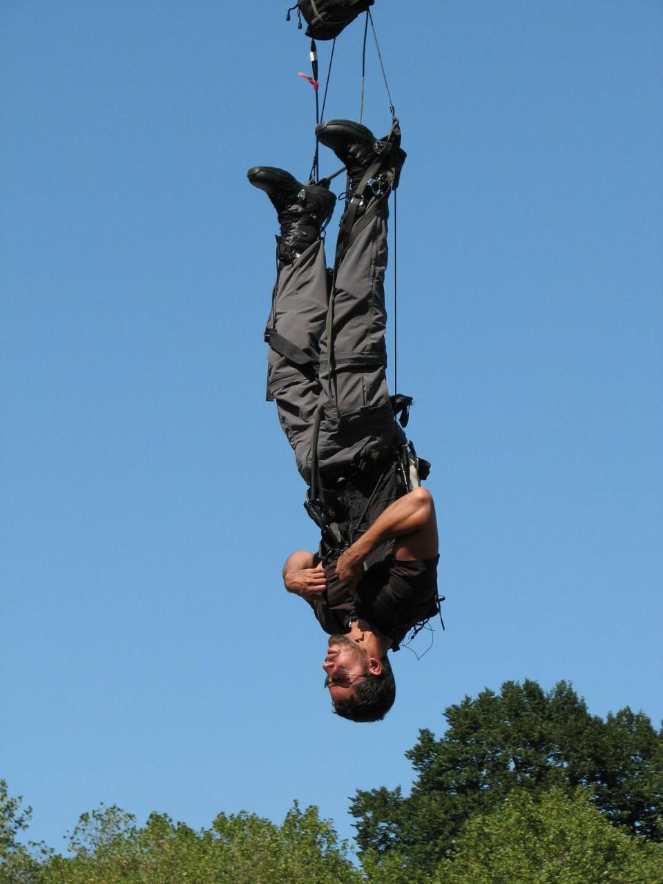 Blaine, attempting to hang upside down for 60 hours in New York's Central Park, is notorious for his dangerous stunts (PA)