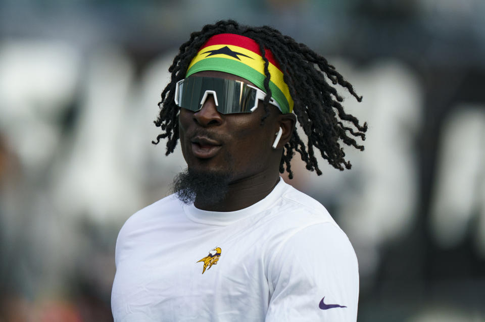 FILE - Minnesota Vikings linebacker Brian Asamoah (33) warms up prior to an NFL football game against the Philadelphia Eagles, Monday, Sept. 19, 2022, in Philadelphia. With a steady stream of players continuing to enter the league with African heritage, the NFL has been slowly making inroads on a continent where American football has long been a distinctly foreign sport. (AP Photo/Chris Szagola, File)