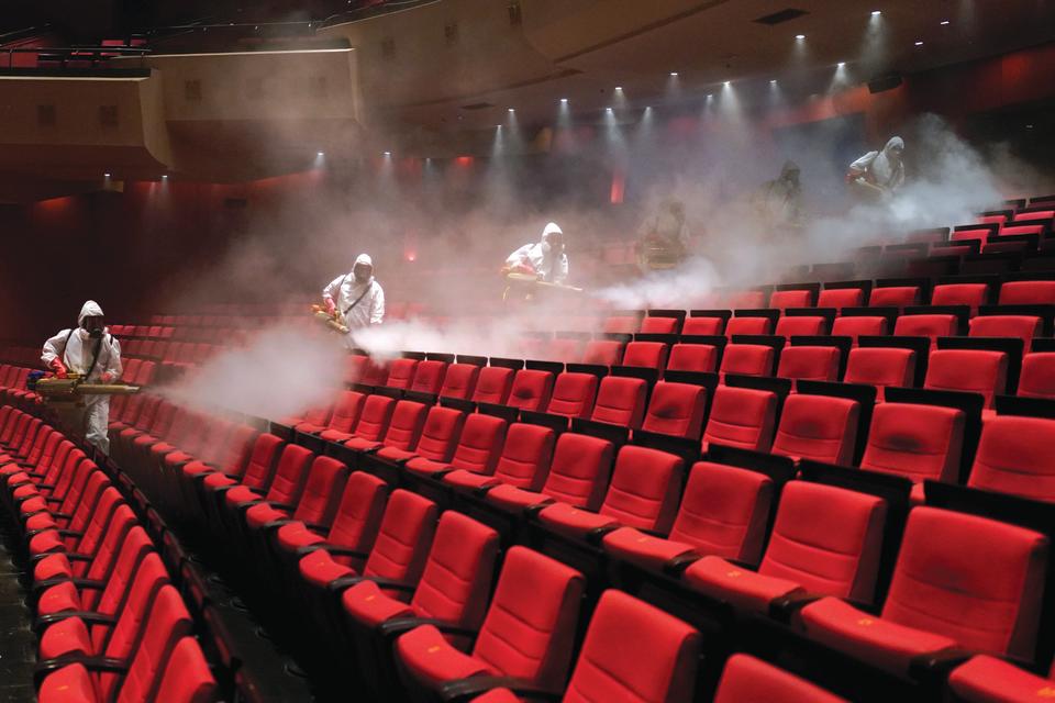 Volunteers disinfect the Qintai Grand Theater in Wuhan, the Chinese epicenter of the COVID-19 outbreak, April 2, 2020. (Photo: Aly Song/Reuters)