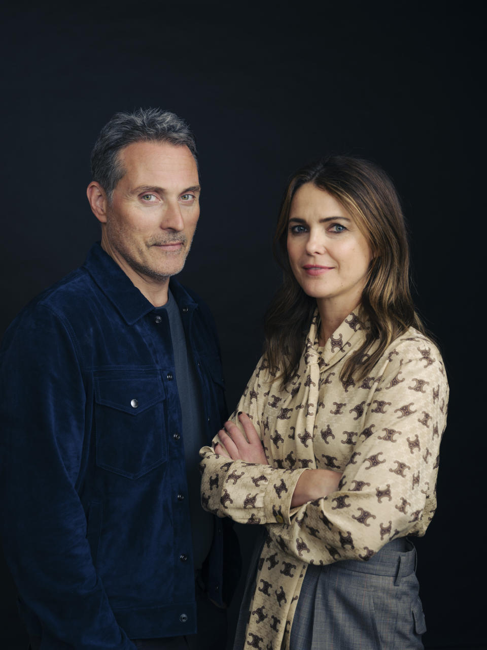 Rufus Sewell, left, and Keri Russell pose for a portrait to promote "The Diplomat" on Friday, April 14, 2023, in New York. (Photo by Drew Gurian/Invision/AP)