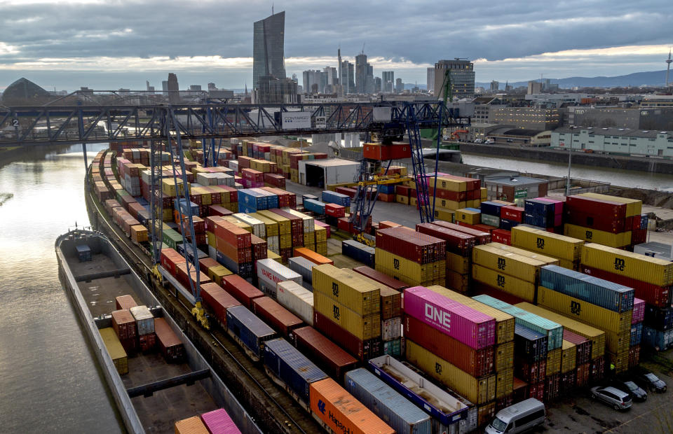 FILE - Containers are pictured in the small harbour in Frankfurt, Germany, Tuesday, Feb. 13, 2024. The German government said Europe's largest economy was in “troubled waters” and slashed its growth forecast for this year as it struggles with a lack of skilled labor, excessive bureaucracy, high interest rates and lagging investment in new projects — while a relatively modest set of tax breaks for business remains blocked in the legislature. (AP Photo/Michael Probst, File)