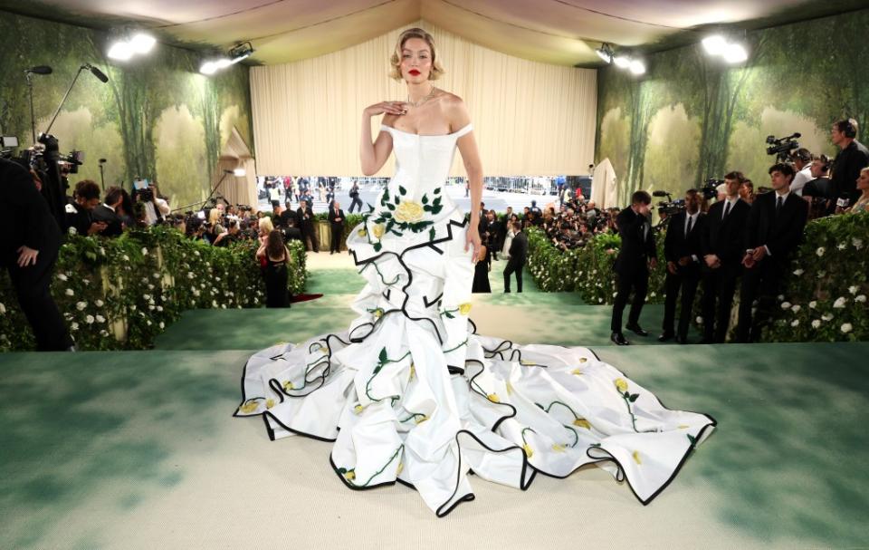 Gigi Hadid wears a voluminous white ballgown to the 2024 Met Gala. Getty Images for The Met Museum/Vogue