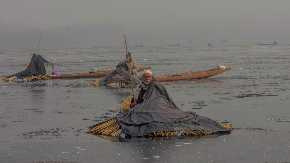 Kashmir fishermen in Srinagar