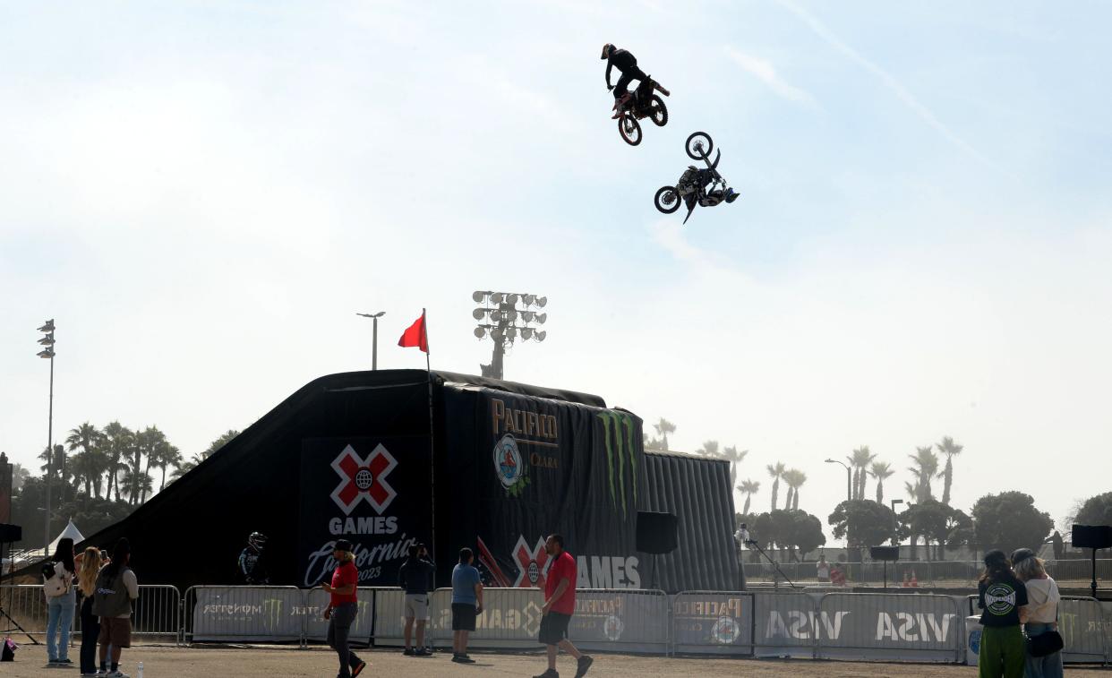 Motorcycles practice during the X Games at the Ventura County Fairgrounds in July. A new sports management program for high school students, which costs nearly $7,000, will allow students to stay at UC Santa Barbara this summer with study focused on the X Games in Ventura.