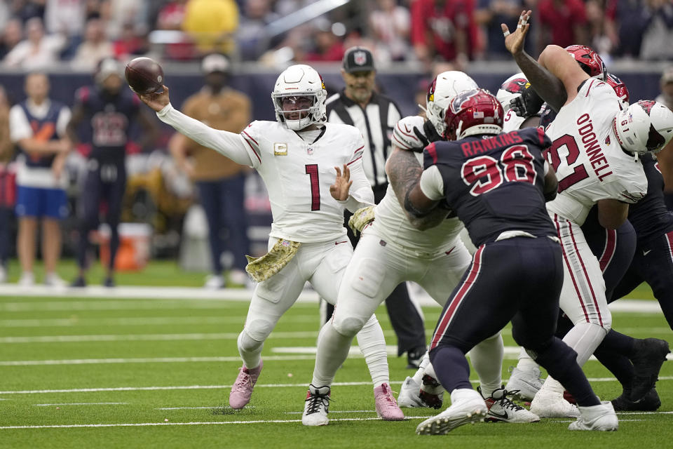 Arizona Cardinals quarterback Kyler Murray (1) throws a pass under pressure from Houston Texans defensive tackle Sheldon Rankins in the second half of an NFL football game in Houston, Sunday, Nov. 19, 2023. (AP Photo/David J. Phillip)