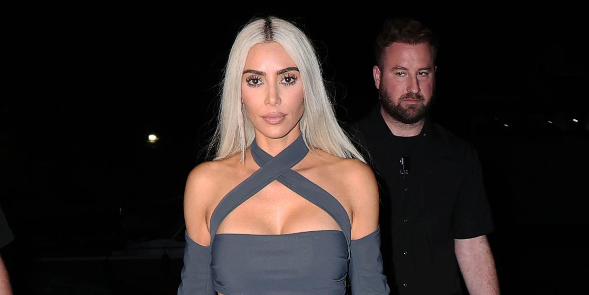 Kim Kardashian Wears Black Corset Dress During Kourtney's Wedding