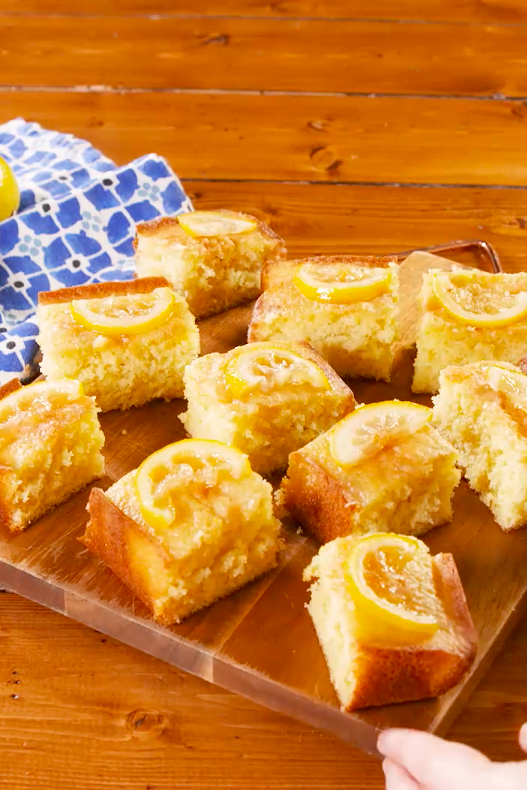 <p>This lemon drizzle <a href="https://www.delish.com/uk/cooking/recipes/a28830505/salted-caramel-sheet-cake-recipe/" rel="nofollow noopener" target="_blank" data-ylk="slk:traybake;elm:context_link;itc:0" class="link ">traybake</a> is a great alternative to the traditional loaf or round cake recipe. Easily cut into slices, it's perfect to serve with <a href="https://www.delish.com/uk/cooking/recipes/g28934063/afternoon-tea-recipes/" rel="nofollow noopener" target="_blank" data-ylk="slk:afternoon tea;elm:context_link;itc:0" class="link ">afternoon tea</a>, a <a href="https://www.delish.com/uk/cooking/recipes/g28841964/bake-sale/" rel="nofollow noopener" target="_blank" data-ylk="slk:bake sale;elm:context_link;itc:0" class="link ">bake sale</a>, or pre-cutting for a <a href="https://www.delish.com/uk/cooking/recipes/g28783985/baking-with-kids/" rel="nofollow noopener" target="_blank" data-ylk="slk:kid's birthday party;elm:context_link;itc:0" class="link ">kid's birthday party</a>.</p><p>Get the <a href="https://www.delish.com/uk/cooking/recipes/a30543470/lemon-drizzle-traybake/" rel="nofollow noopener" target="_blank" data-ylk="slk:Lemon Drizzle Traybake;elm:context_link;itc:0" class="link ">Lemon Drizzle Traybake</a> recipe</p>