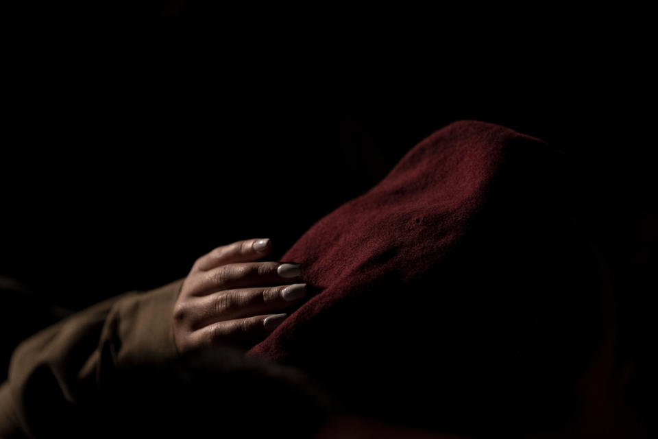 An Israeli Army soldier adjusts her beret at the funeral for Maj. Bar Falah, killed during a West Bank operation, in Netanya, Israel, Wednesday, Sept. 14, 2022. Palestinian gunmen opened fire on Israeli troops near a military checkpoint in the occupied West Bank Wednesday, killing Maj. Falah, Israel's military said. Palestinian officials said that troops killed the two gunmen.(AP Photo/ Maya Alleruzzo)