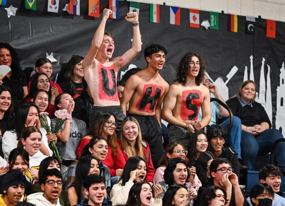 Shirtless University High School fans cheer on their Academic Decathlon team in the gymnasium at Sunnyside High School during the Super Quiz portion of the 42nd annual Fresno County Academic Decathlon on Saturday, Feb. 3 2024. CRAIG KOHLRUSS/ckohlruss@fresnobee.com