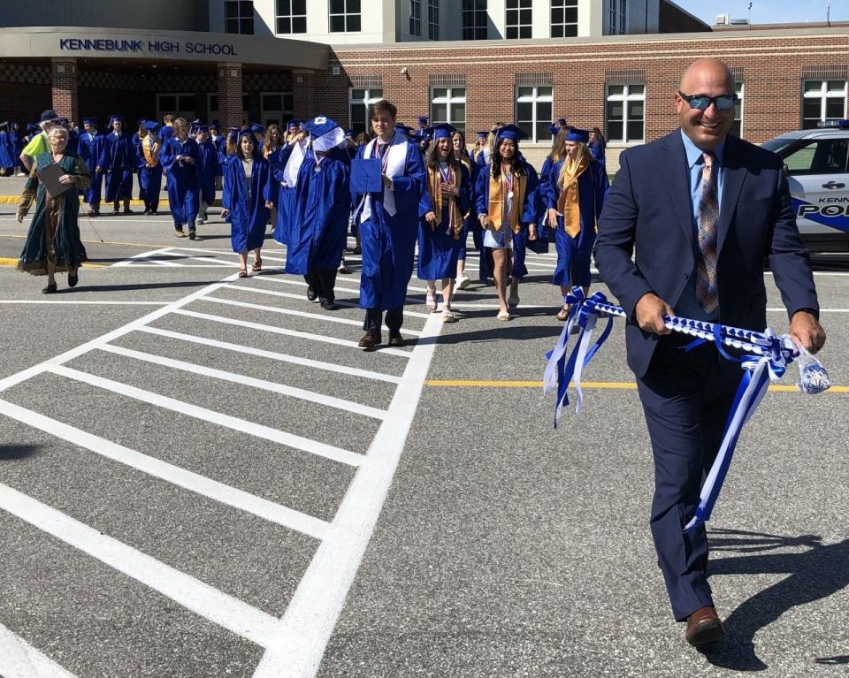 Kennebunk High School Principal Jeremie Sirois leads graduates of the Class of 2022 to their commencement ceremony on Sunday, June 5, 2022.