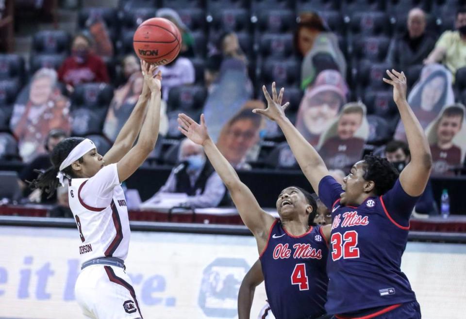 South Carolina Gamecocks guard Destanni Henderson (3) shoots over Ole Miss guard Valerie Nesbitt (4) and forward Iyanla Kitchens (32) during the first half of action in the Colonial Life Arena in Columbia, S.C.