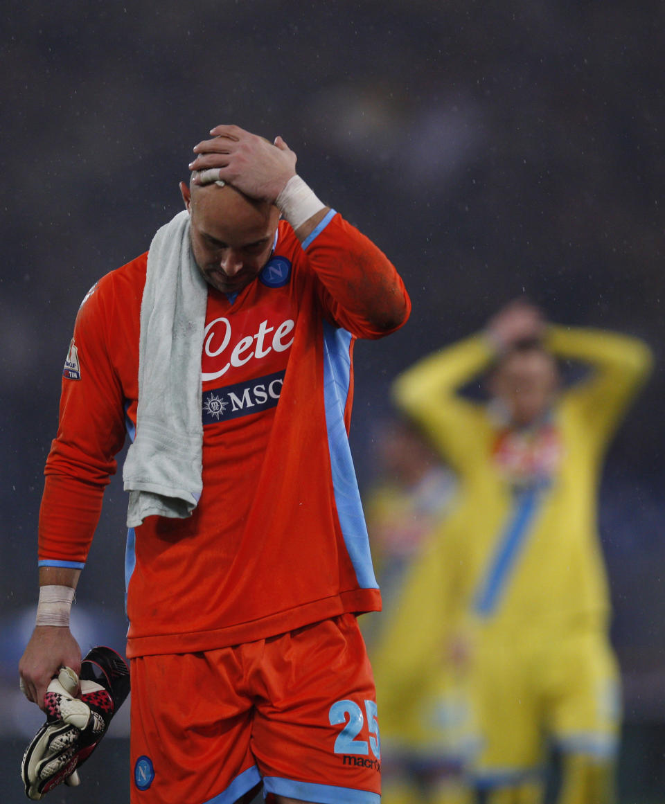 Napoli goalkeeper Jose Manuel Reina leaves the pitch after an Italian Cup, semifinal first leg match, between AS Roma and Napoli at Rome's Olympic stadium, Wednesday, Feb. 5, 2014. (AP Photo/Alessandra Tarantino)