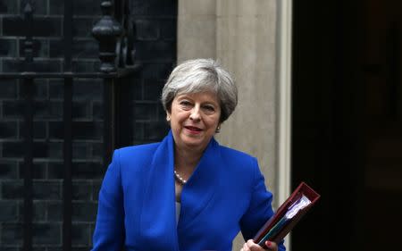 Britain’s Prime Minister Theresa May leaves Downing Street in London, Britain July 19, 2017. REUTERS/Neil Hall