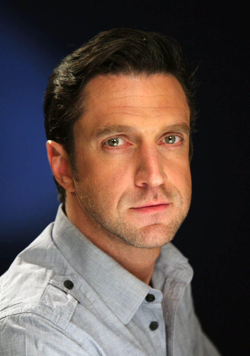 In this April 19, 2012 photo, Raul Esparza, currently starring in the musical "Leap of Faith" on Broadway, is shown in New York. He plays the huckster Jonas Nightingale, whose traveling revival show gets stranded in a drought-stricken Kansas town after their bus breaks down. (AP Photo/John Carucci)