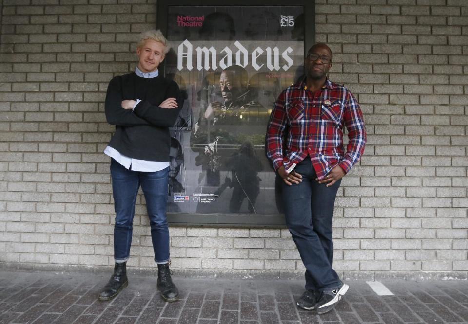 Lucian Msamati and Adam Gillen, left, the stars of the theatre play Amadeus, pose for a photograph in London, Monday, Jan. 30, 2017. Britain's National Theatre has a sold-out hit with a revival of Peter Shaffer's play about bad-boy genius Wolfgang Amadeus Mozart, played by Gillen, and his jealous rival Antonio Salieri, played by Msamati, composer to the 18th-century Viennese court. (AP Photo/Frank Augstein)