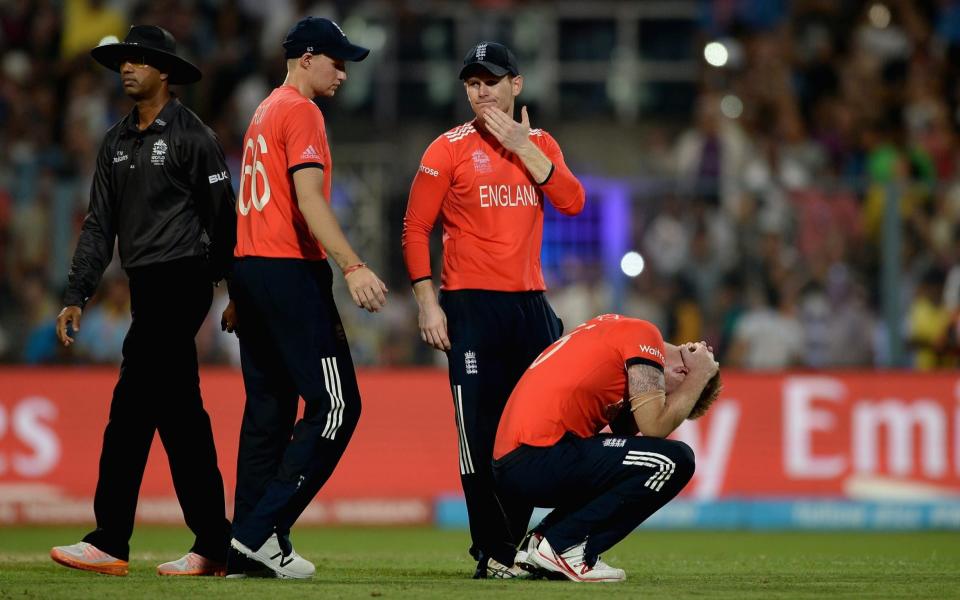 APRIL 03: Joe Root, captain Eoin Morgan and Ben Stokes of England react after losing the ICC World Twenty20 India 2016 Final between England and the West Indies at Eden Gardens on April 3, 2016 in Kolkata, India - GETTY IMAGES