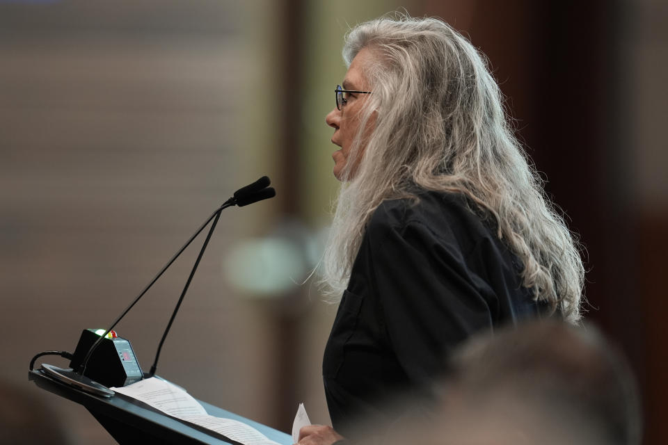 Nanette Mahler speaks in opposition of a proposed natural gas plant planned for Cheatham County during a Tennessee Valley Authority Board of Directors listening session, Wednesday, May 8, 2024, in Nashville, Tenn. The nation’s largest public utility is moving ahead with a plan for a new natural gas plant in Tennessee despite warnings that its environmental review of the project doesn't comply with federal law. (AP Photo/George Walker IV)