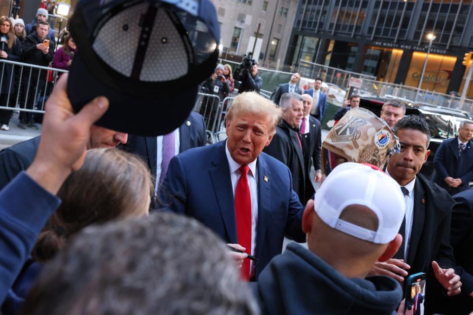 Former US President Donald Trump greets union workers at the construction site of the new J.P. Morgan Chase building (Getty Images)