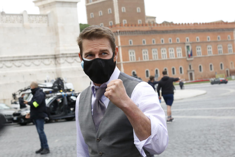 Tom Cruise talks with his fans on the set of Mission Impossible 7 in Rome, Italy on Nov. 29, 2020. 